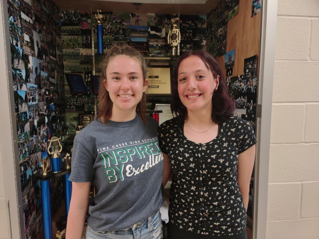 Two girls, smiling for the camera